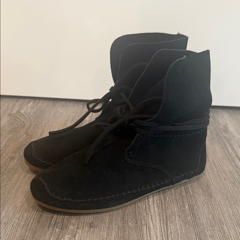 Tom’s Black Suede Moccasin gold over ankle boot with wrap around laces